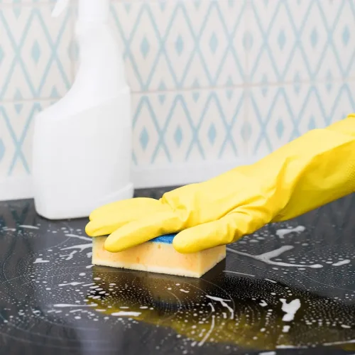 yellow-sponge-on-the-stove-in-the-foam-general-cl-2025-02-14-05-22-47-utc